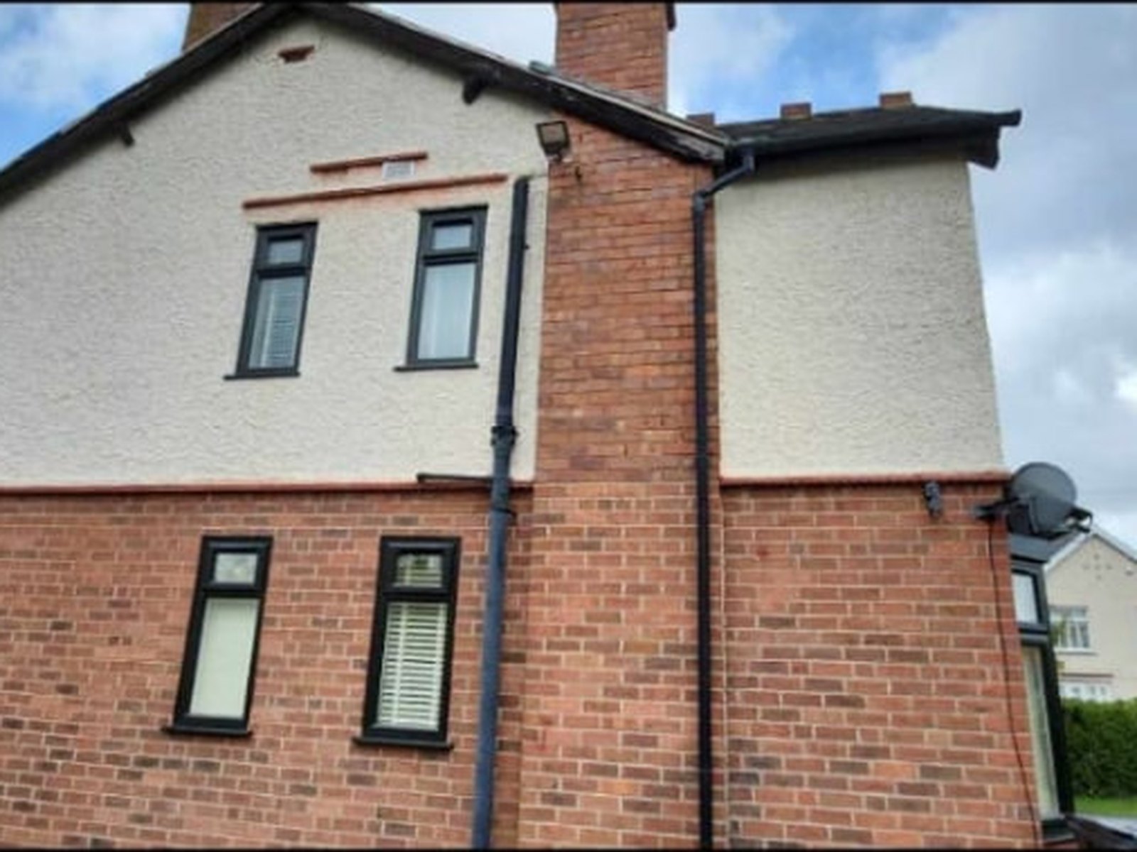 Side elevation with old textured render before the work